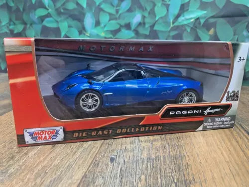 Blue Pagani Huayra 1:24 diecast car in sealed retail box, Motor Max logo visible