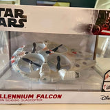 Quadcopter drone in clear retail box with visible propellers and controller parts