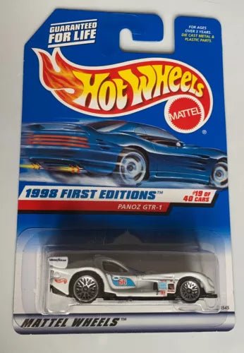 White Hot Wheels diecast race car in blister pack, numbered 657