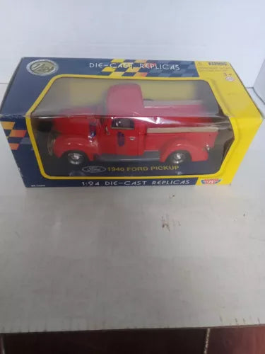 Red 1940 Ford pickup die-cast replica in retail box, 1:24 scale