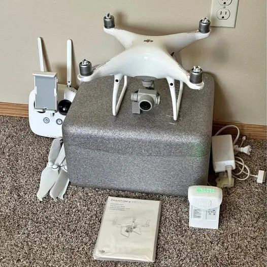 DJI Phantom 4 Pro V2.0 drone, white quadcopter with camera gimbal