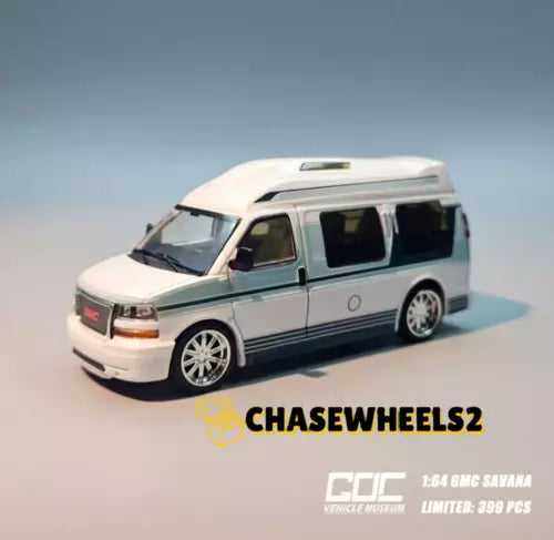 White vintage GMC Savana cutaway van diecast model toy, 1:64 scale, metal.