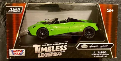 Green 1:24 diecast model roadster car in display box, black wheels and detailing