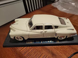 White 1:18 scale diecast classic car model with chrome trim and detailed wheels
