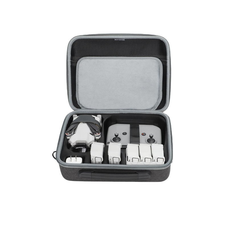 Hard travel carrying case with foam interior, open showing remote controller compartments