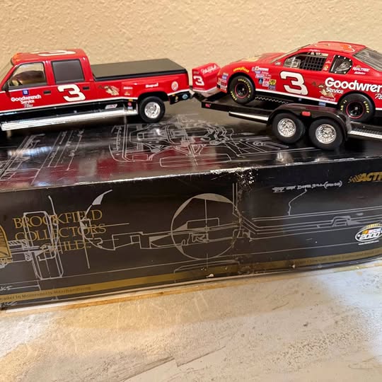 Red diecast dually car hauler with two-axle trailer and black race car with number 3