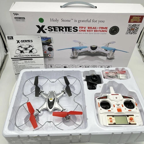 FPV quadcopter drone with controller and propellers in retail box, gray and white