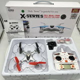 FPV quadcopter drone with controller and propellers in retail box, gray and white