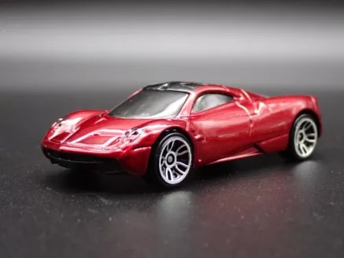 1:64 scale red and silver diecast model car with detailed front