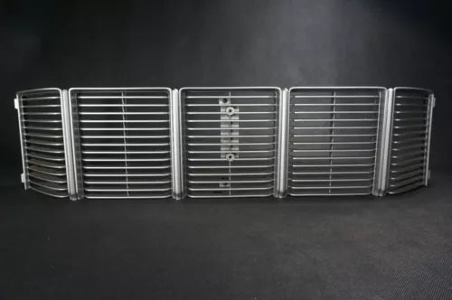 1/18 diecast car front grille in silver with center emblem and twin headlight bays