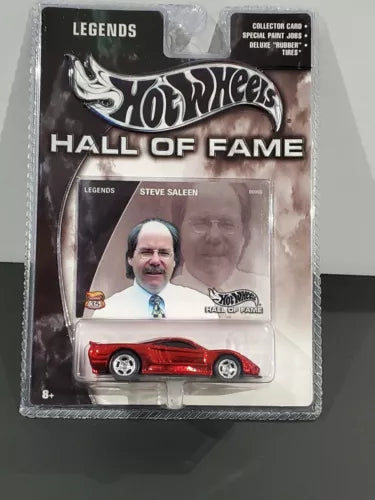 Red chrome 1/64 diecast car in clear blister packaging, Hall of Fame Legends card