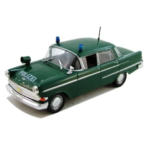 Green Opel Kapitan police diecast model car, front 3/4 view, windshield lights