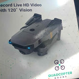 Gray quadcopter drone with blue lights, compact body and four propellers