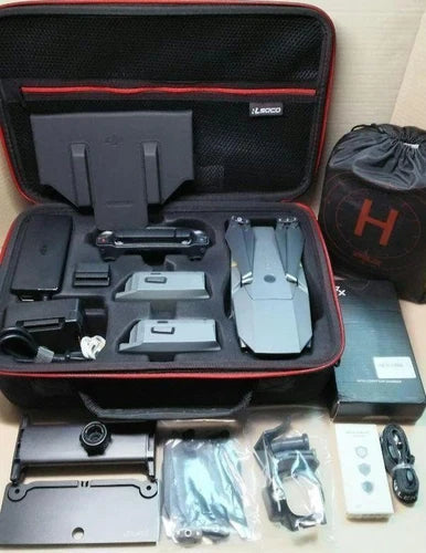 Drone kit in hard case with drone, extra batteries, propellers, and accessories
