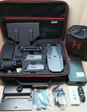 Drone kit in hard case with drone, extra batteries, propellers, and accessories