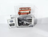 Diecast model bus in retail box, red and cream livery.