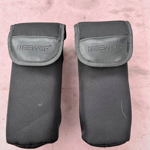 NEEWER black fabric drone pouches with flip-top flap and logo, two-pack