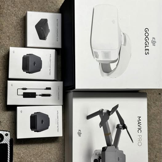 DJI Mavic Pro drone and Goggles VR headset bundle with accessories in boxes