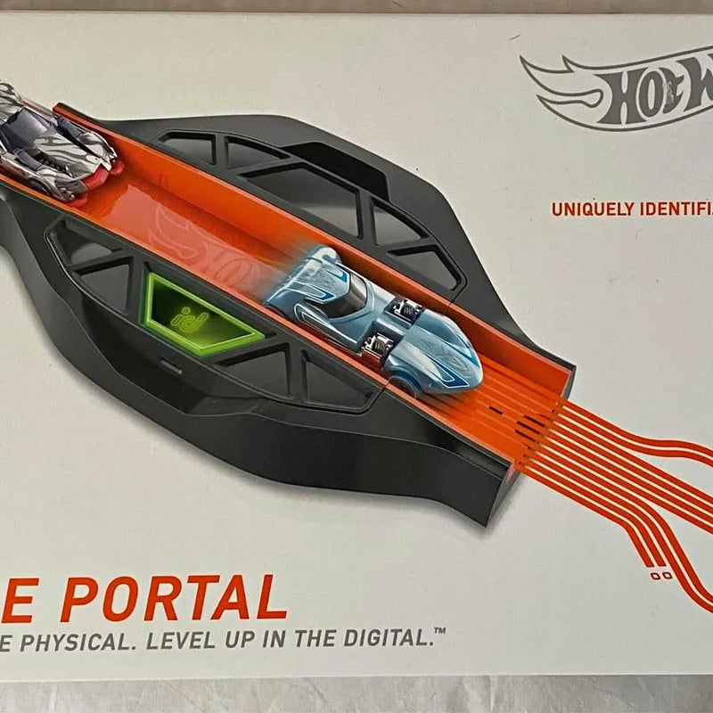 Hot Wheels smart track portal with orange-black track, green display, and 2 diecast cars