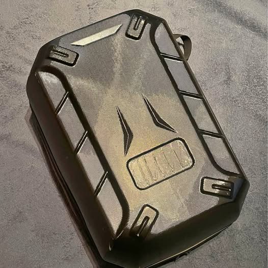 Black drone body with angular protective housing and vents