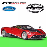 Red Pagani Huayra diecast model car, front 3/4 view with detailed wheels.