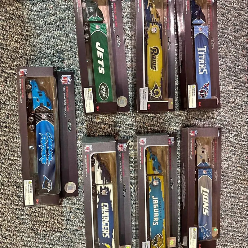 NFL-themed diecast truck and license plate collectibles in retail boxes, multi-pack