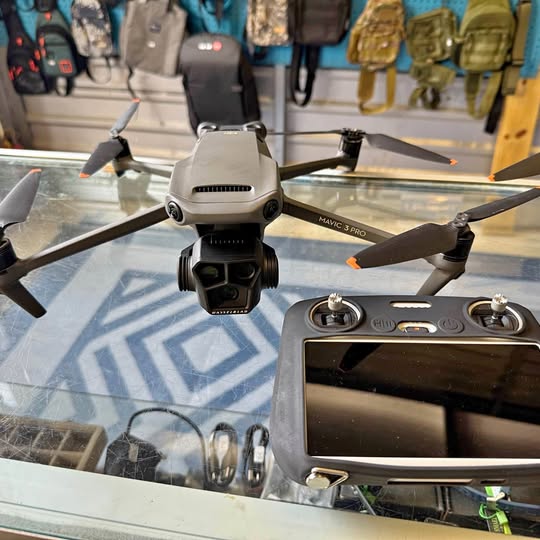 DJI Mavic 3 Pro drone with folded propellers and front camera module