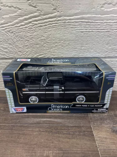 1969 Ford F-100 pickup diecast model in box, black with American Classics branding