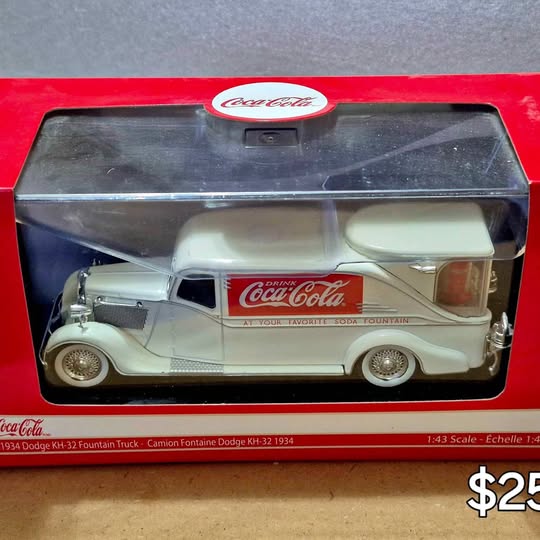 Diecast Coca-Cola fountain truck model, pale light blue cab with white grille, in box