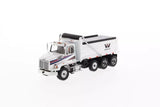 White diecast dump truck model with cab and rear dump bed, W logo on side.