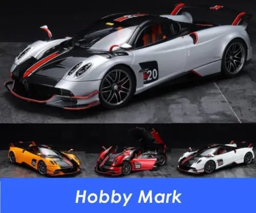 Silver diecast Pagani Huayra Roadster BC model car with red accents and black wheels