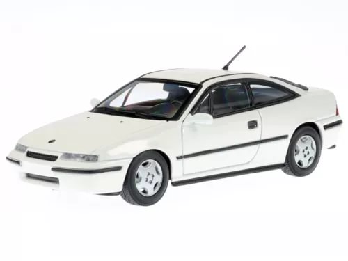 White Opel Calibra diecast model car, Maxichamps 1:43, side view