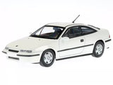 White Opel Calibra diecast model car, Maxichamps 1:43, side view