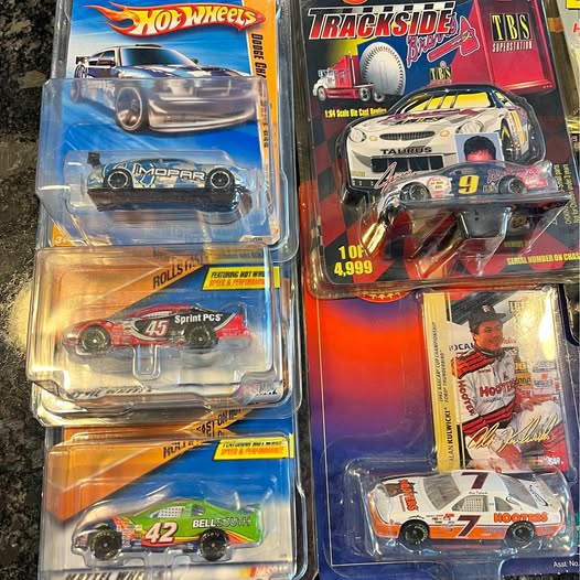 1/64 diecast cars in blister packs, featuring Hot Wheels and Trackside Bay Racing