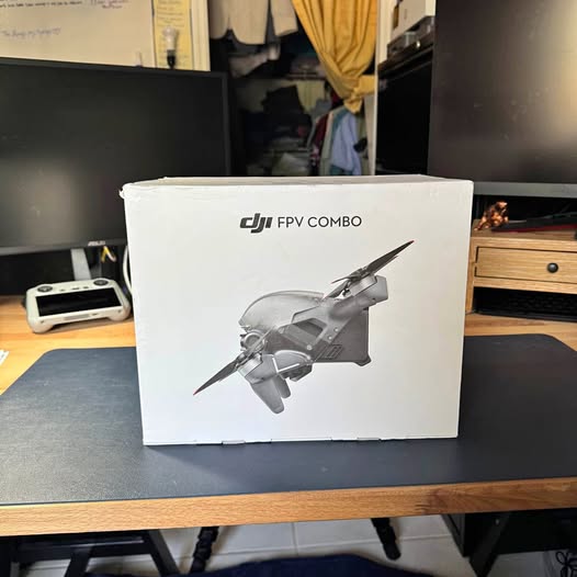 DJI FPV Combo drone box, white shipping package with drone graphic