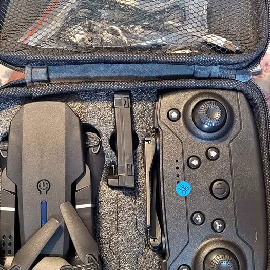 Drone remote controller in hard case, with joysticks and control buttons