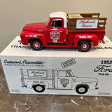 Red 1:34 diecast 1953 Ford flathead pickup truck model in open box packaging