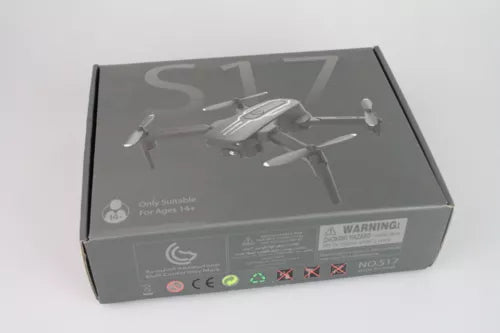 Mini drone in retail box, gray top panel with drone photo and label details