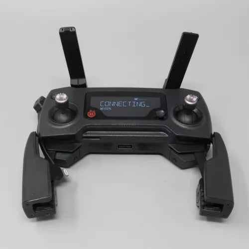 DJI radio remote controller with two antennas, dual joysticks, and display