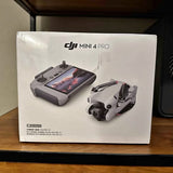 DJI Mini 4 Pro Fly More Bundle box with drone and controller
