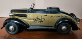 Cream and dark blue 1937-style diecast car coin bank with black wheels