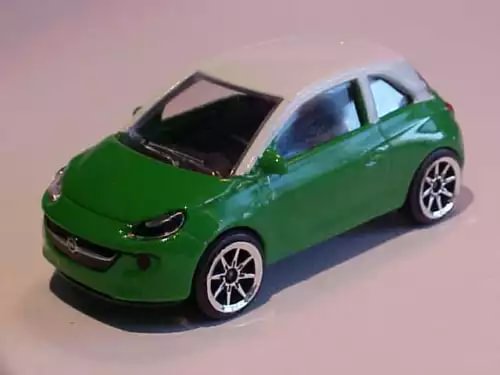 Green Opel Adam 1/64 diecast toy car, front three-quarter view
