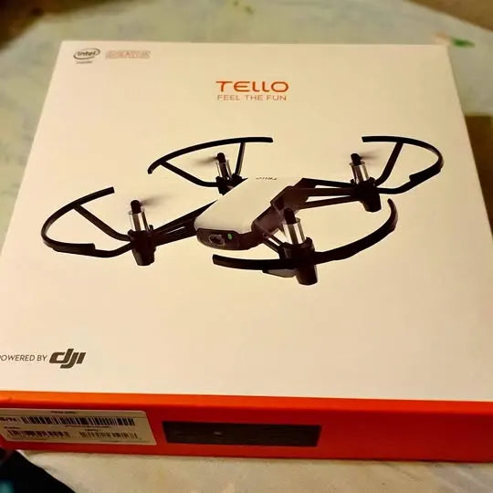 Tello quadcopter drone box with printed drone illustration and FEEL THE FUN text