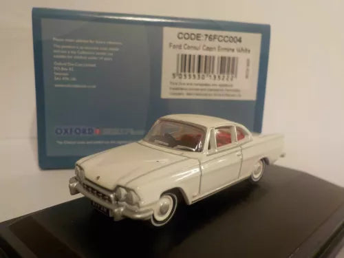 Ermine white diecast Ford Consul Capri model car with red interior, front 3/4 view