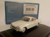 Ermine white diecast Ford Consul Capri model car with red interior, front 3/4 view