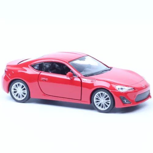 Red diecast sports car pull-back toy model, side view with silver wheels