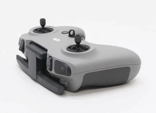 DJI FPV Remote Controller 2 gray handheld with dual joysticks and grip