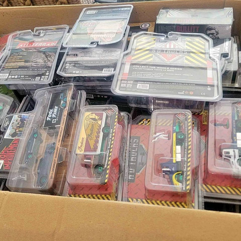 Hotwheels diecast car blister packs set in a cardboard box