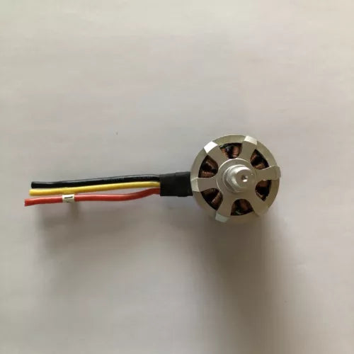 Silver quadcopter motor with four screw mounts and red, yellow, black wires