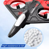 Black and red RC drone plane with controller, front view; includes white foam pellets